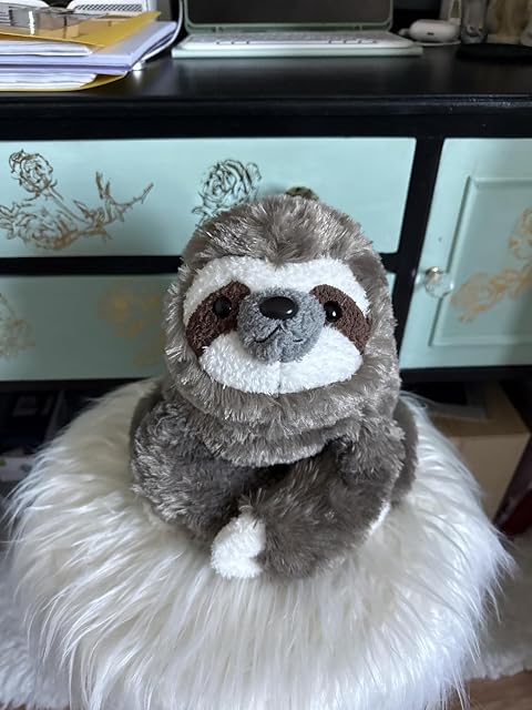 Customer photo of a Cuddle Buds weighted plush